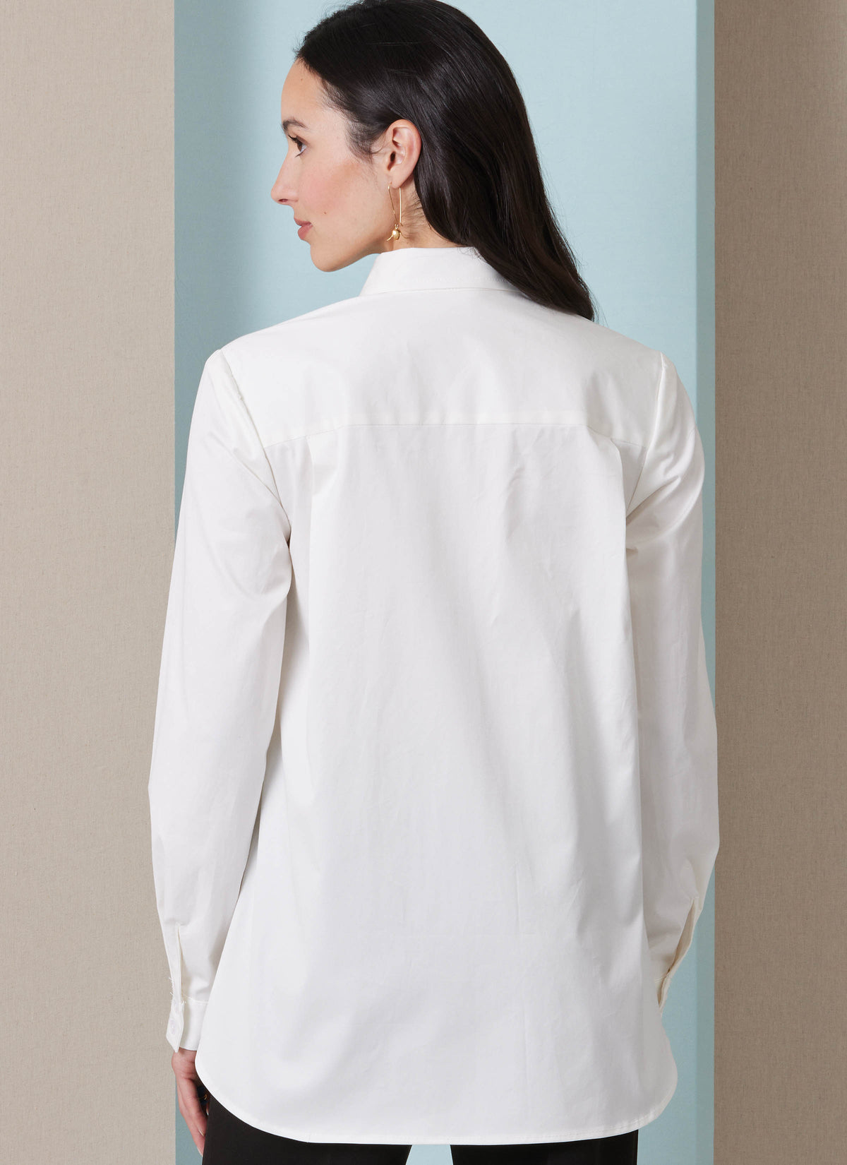 Butterick B7079 sewing pattern envelope showing a loose-fitting asymmetric wrap top