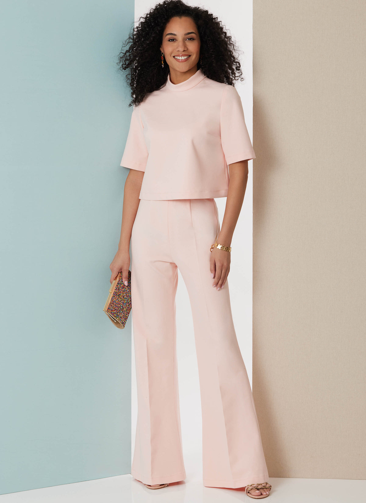 Butterick B7082 sewing pattern envelope showing semi-fitted cropped tops
