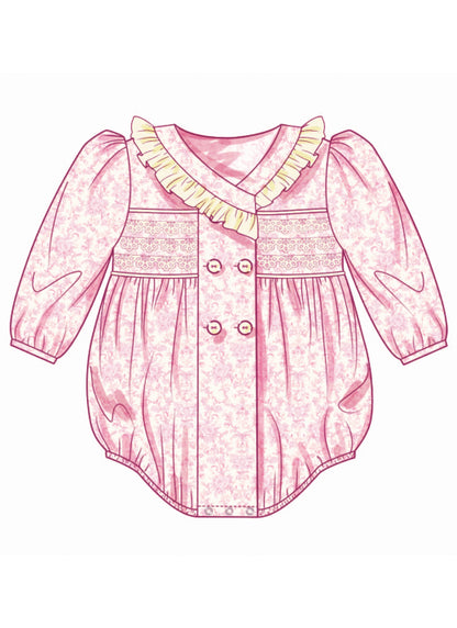 Butterick B7085 sewing pattern envelope showing a vintage-inspired double-breasted baby romper