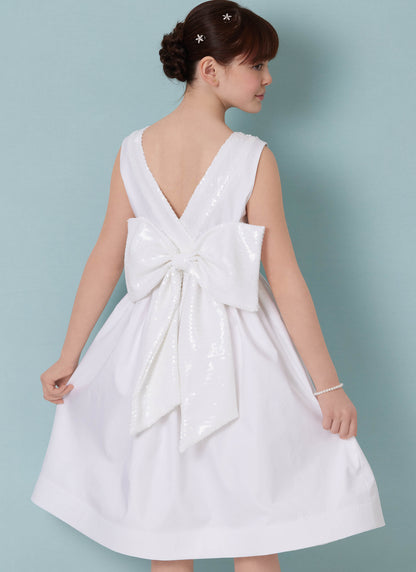 Butterick B7089 sewing pattern envelope showing a girls' lined special occasion dress with petticoat