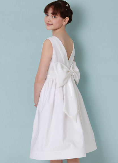 Butterick B7089 sewing pattern envelope showing a girls' lined special occasion dress with petticoat