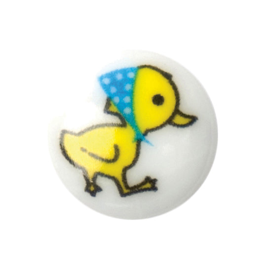 Round white button with yellow duckling print