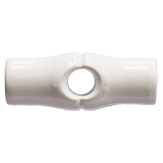 White barrel-shaped toggle button