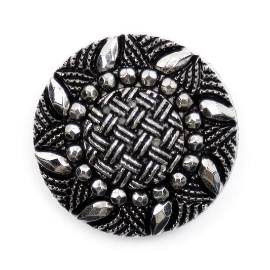 Round silver and black ornate button with a woven centre
