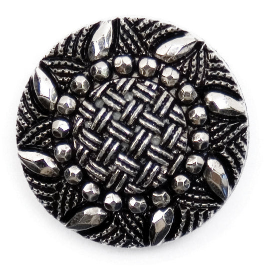 Round silver and black ornate button with a woven centre