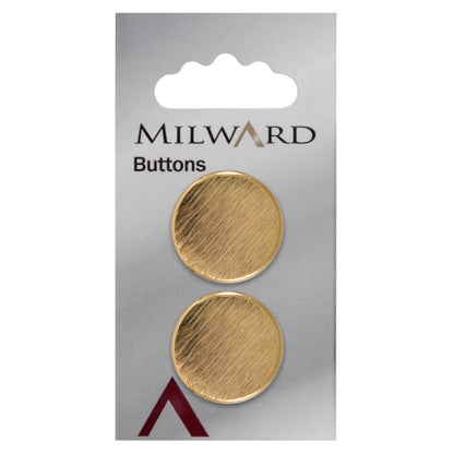 Round gold metal button with a brushed finish