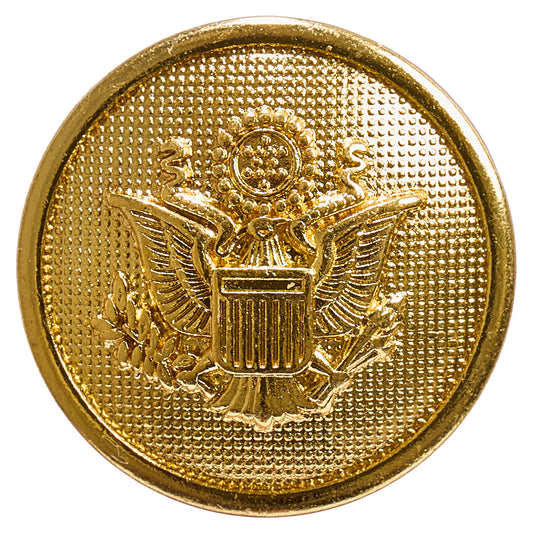 Round gold metal button with an embossed eagle crest