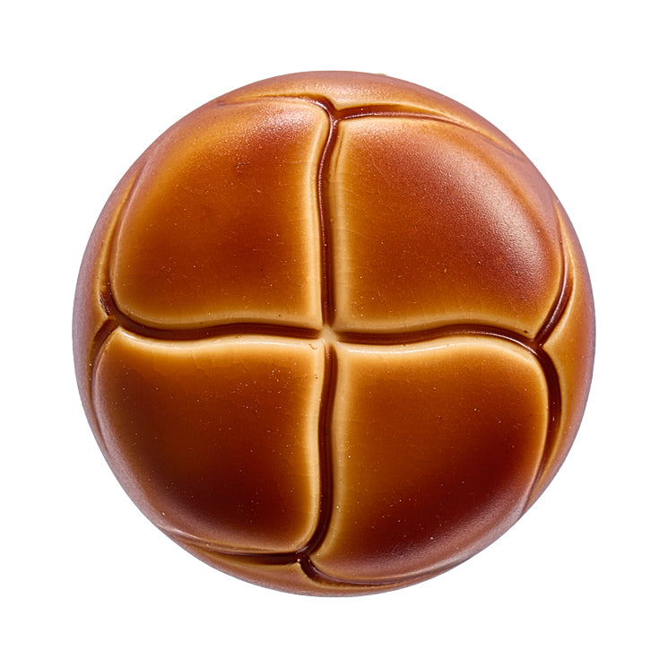 Domed tan leather-look button with woven pattern