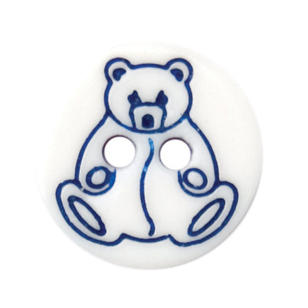 Round white button with a blue outlined teddy bear