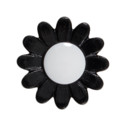 Black daisy-shaped button with a white centre