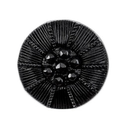 Round black button with faceted centre and radiating ribbed lines