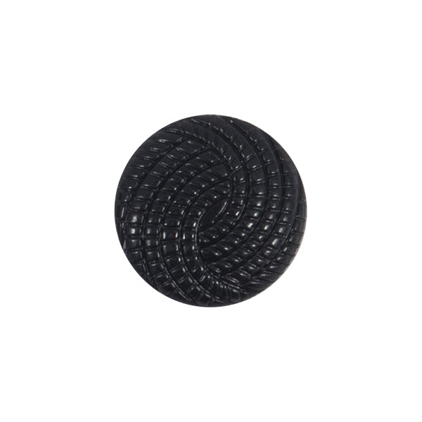 Round black button with a textured swirl pattern