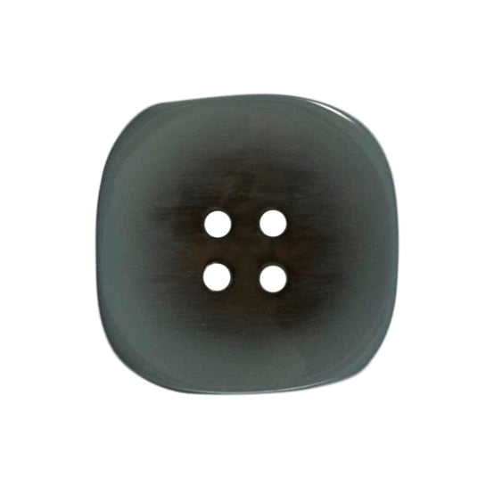 Two 22mm rounded square, two-tone teal buttons on a Milward card