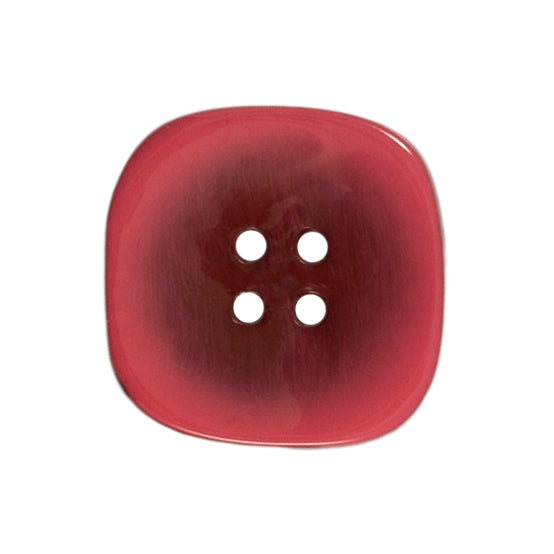 Two 22mm rounded square, two-tone pink buttons on a Milward card