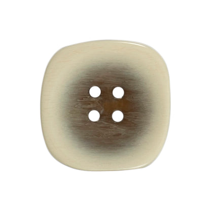 Two 22mm rounded square, two-tone natural buttons on a Milward card