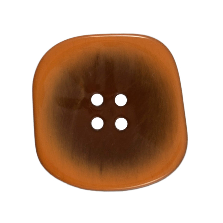 One 34mm rounded square, two-tone orange button on a Milward card