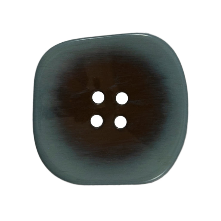 One 34mm rounded square, two-tone teal button on a Milward card