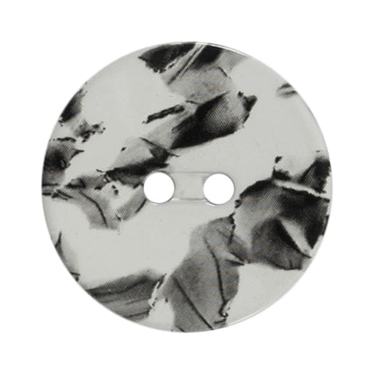 One 28mm round white button with a black marble effect on a Milward card