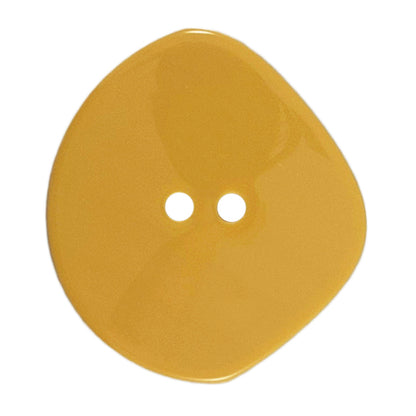 One 38mm large shaped mustard button on a Milward card