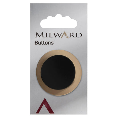 Large gold button with a curved black centre on a Milward card