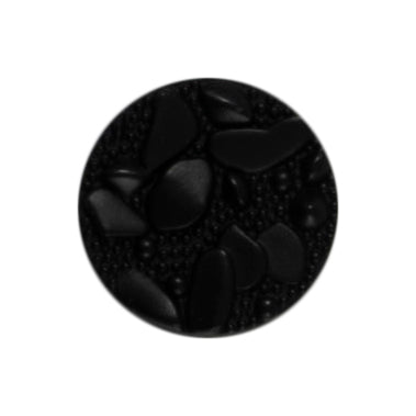 Two irregular matt black stone effect buttons on a card