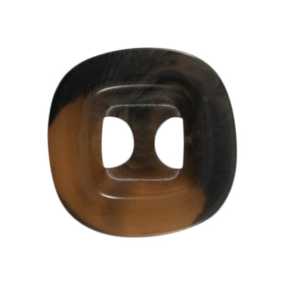 Chunky medium brown square button on a card
