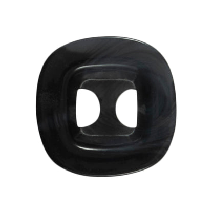 Black chunky square button on a Milward card