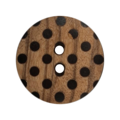 2 round wooden buttons with black polka dots on a Milward card