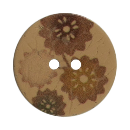 2 round coconut buttons with a flower print on a Milward card