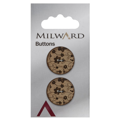 2 coconut buttons with an engraved flower design on a Milward card