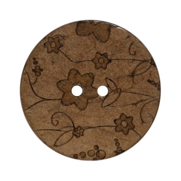 2 coconut buttons with an engraved flower design on a Milward card