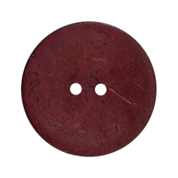 Round wine coconut button on a Milward card