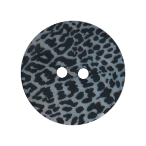 2 mother of pearl buttons with an animal print on a Milward card