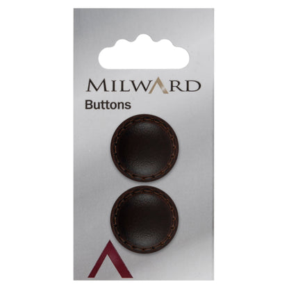 Two chocolate brown imitation leather buttons with stitched rims on a Milward card
