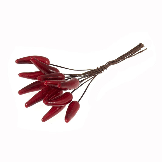 Bunch of small red artificial chilli peppers on wire