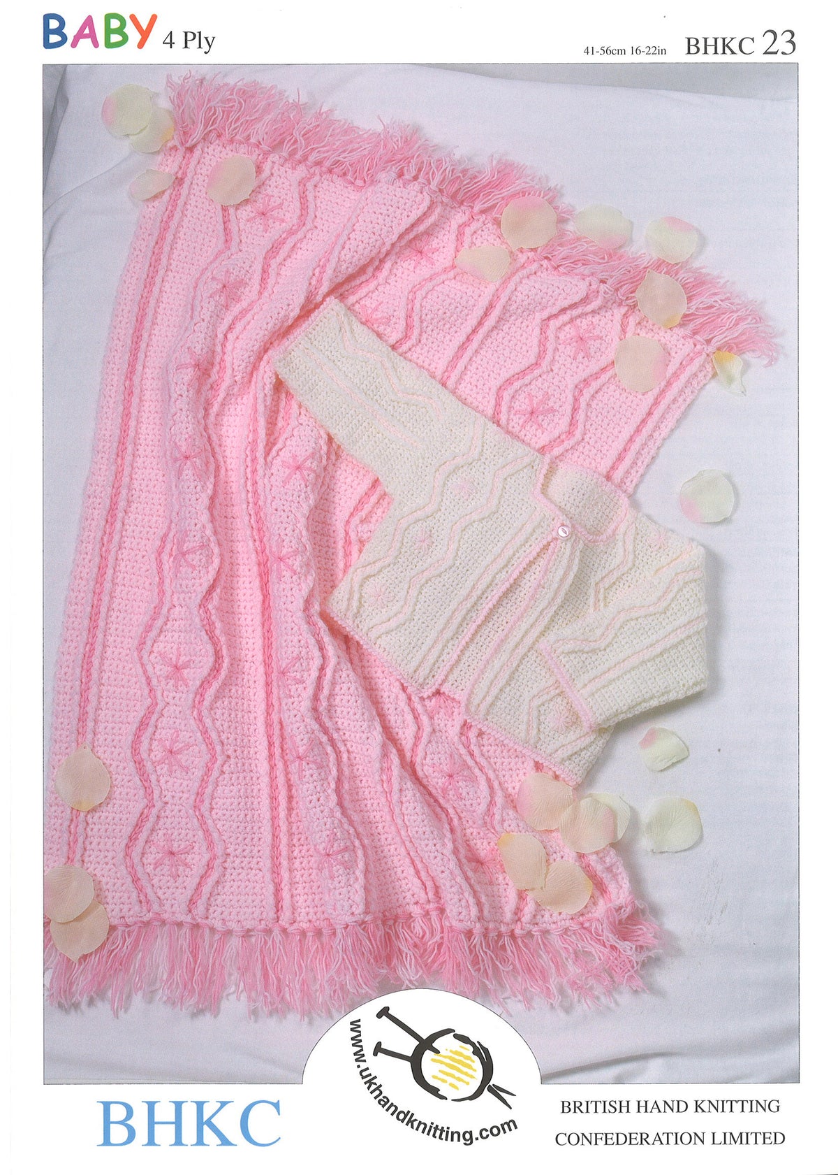 Knitting pattern cover showing jacket and pram blanket