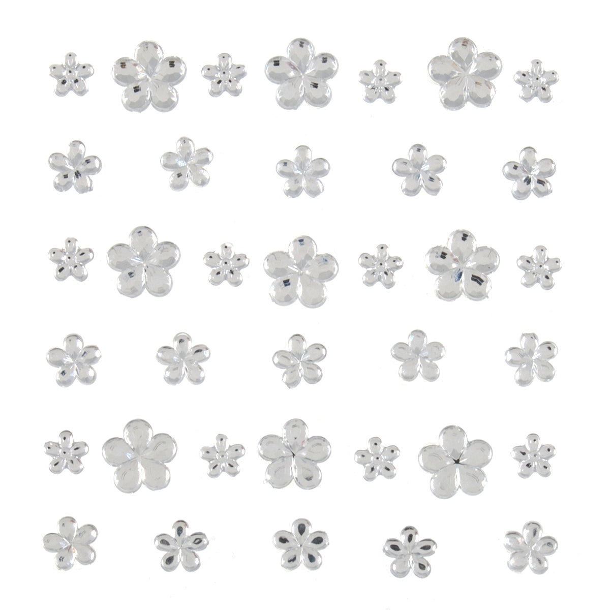 Assorted clear flower-shaped craft gems