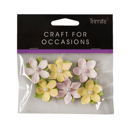 Pink and yellow paper flowers with pearl centres