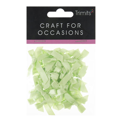 Small light green satin ribbon bows