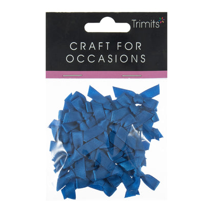 Small bright blue satin ribbon bows