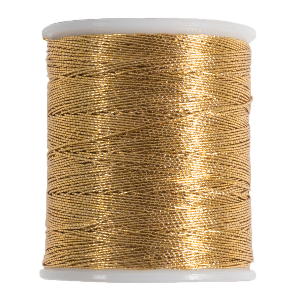 Spool of gold metallic embroidery thread