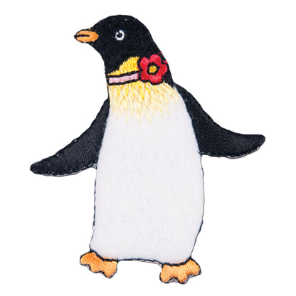 Embroidered dancing penguin motif