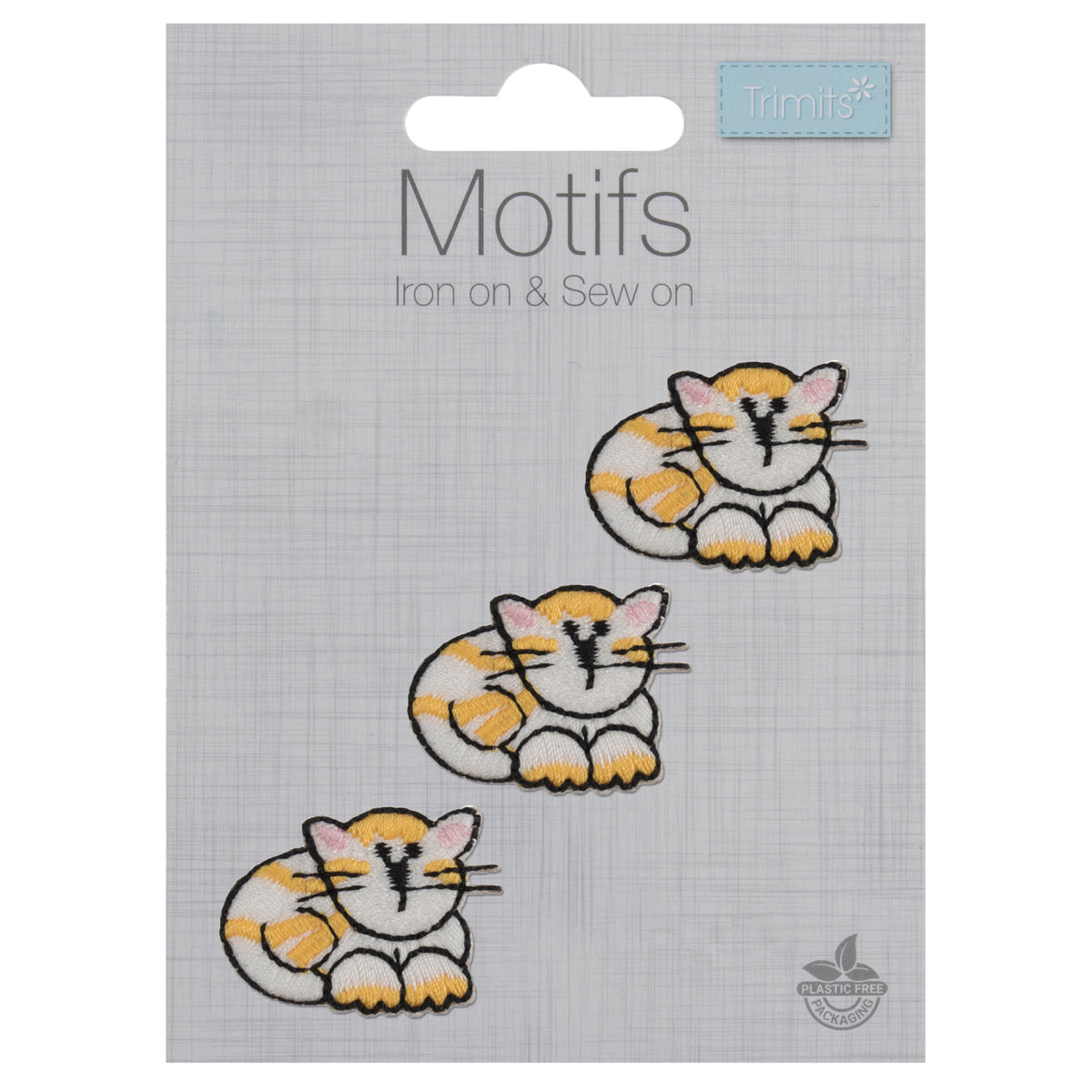 Three small embroidered white and ginger cat motifs