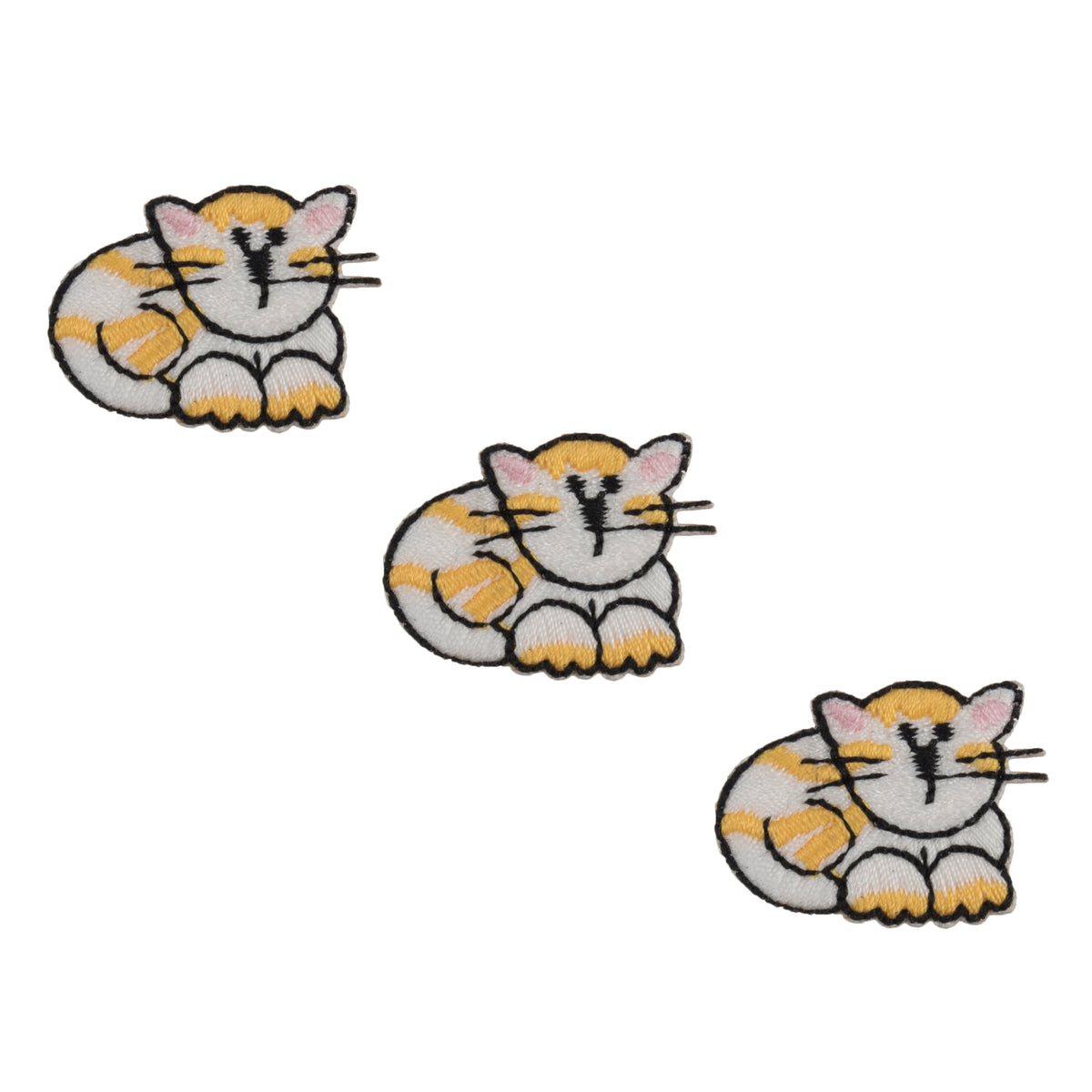 Three small embroidered white and ginger cat motifs