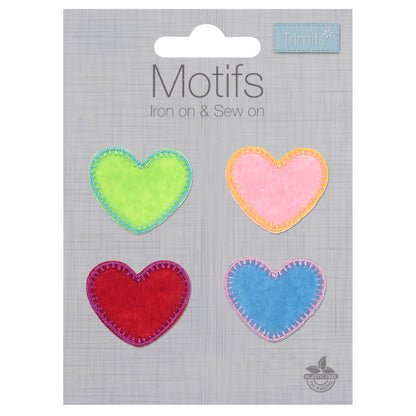Four heart motifs in green, pink, red and blue