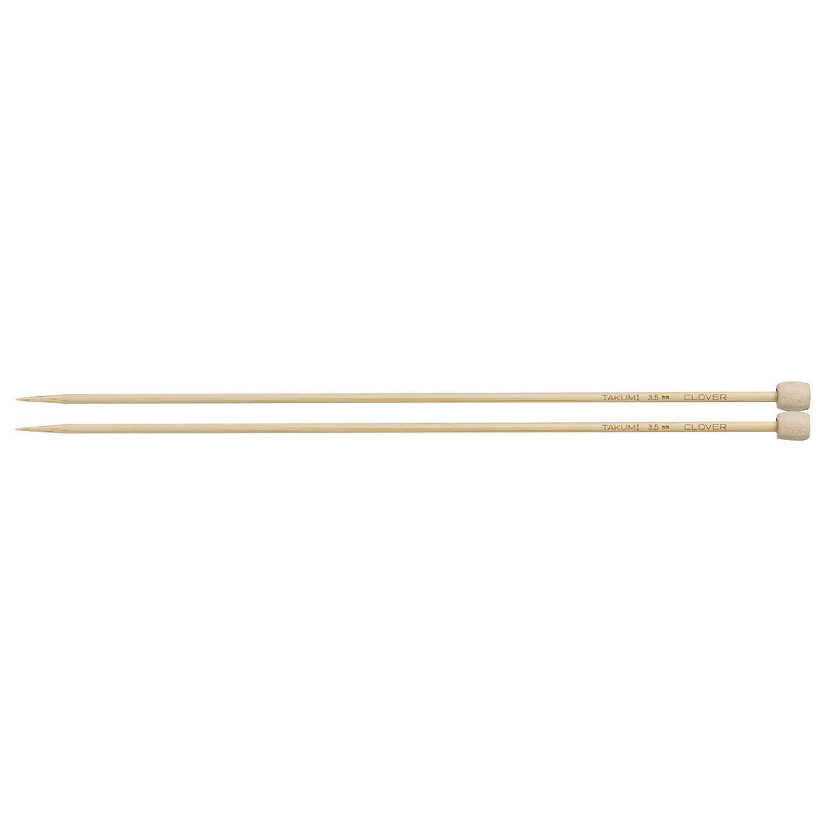 Pair of Clover Takumi bamboo knitting needles, 23cm x 3.5mm, in green packaging
