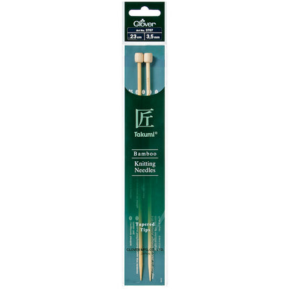 Pair of Clover Takumi bamboo knitting needles, 23cm x 3.5mm, in green packaging