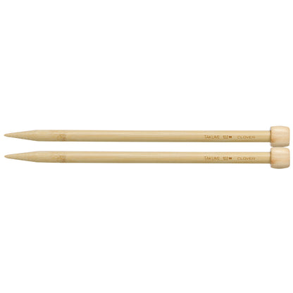 Pair of Clover Takumi bamboo knitting needles, 23cm x 10mm, in green packaging