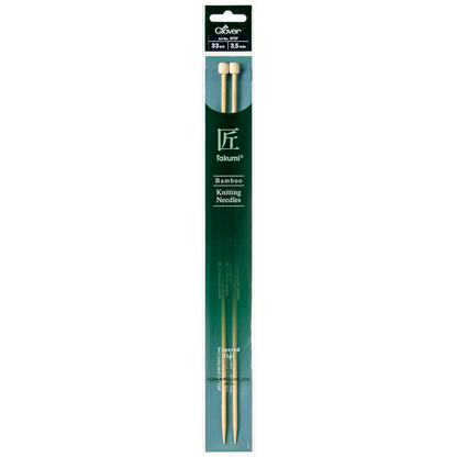 Pair of Clover Takumi bamboo knitting needles, 33cm x 3.5mm, in green packaging