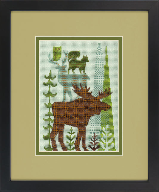 Finished Forest Folklore cross stitch of stacked woodland animals